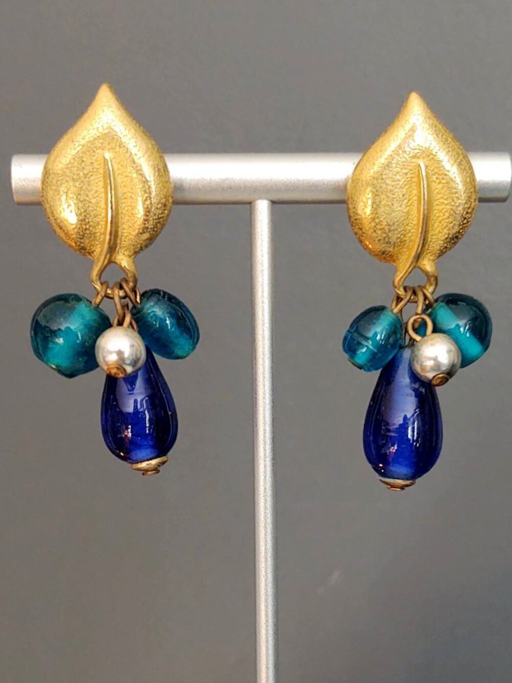 Gold earrings with silver and blue glass beads